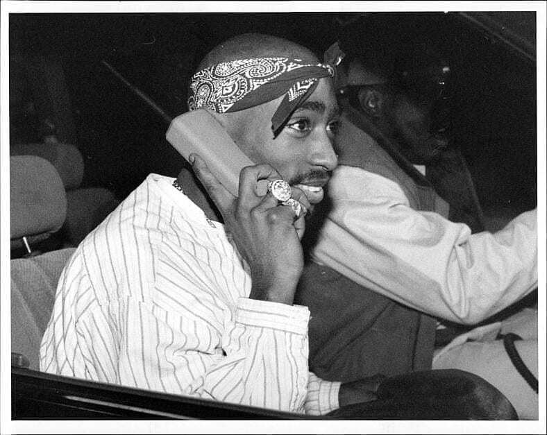 EXCLUSIVE: Tupac Shakur leaving New York City's Civil Court Tuesday evening. The jury was held overnight and he was sent home. November 29, 1994.