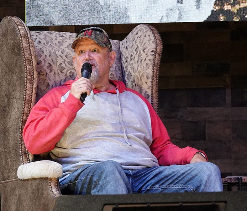Larry the Cable Guy speaks onstage