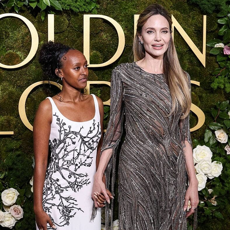 Angelina Jolie and daughter Zahara Jolie at the 82nd Annual Golden Globe Awards
