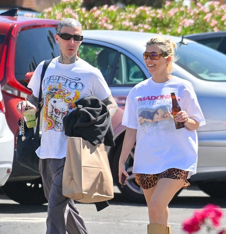 Kourtney Kardashian and Travis Barker head out for lunch at a vegan restaurant in Palm Desert after celebrating their first anniversary