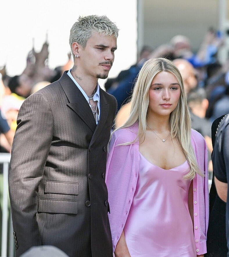 David Beckham and his family make their way to his star ceremony in Hollywood