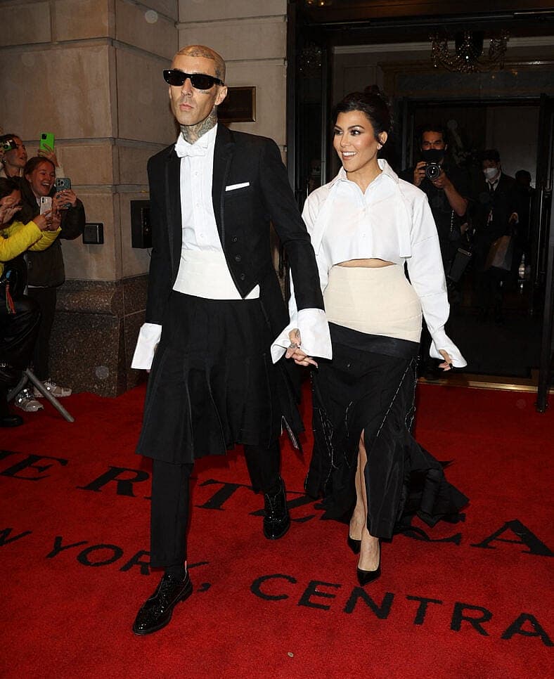 Kourtney Kardashian and Travis Barker leave the Ritz Carlton Hotel on their way to the Met Gala
