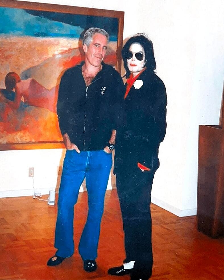Jeffrey Epstein and Michael Jackson are neen in This undated photo released by the U.S. Department of Justice