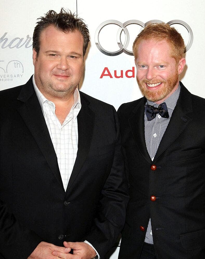 Eric Stonestreet & Jesse Tyler Ferguson Recall They ‘Took The Heat’ On ‘Modern Family’ As A Gay Couple 2 Eric Stonestreet and Jesse Tyler Ferguson at a cocktail party to kick-off Emmy week