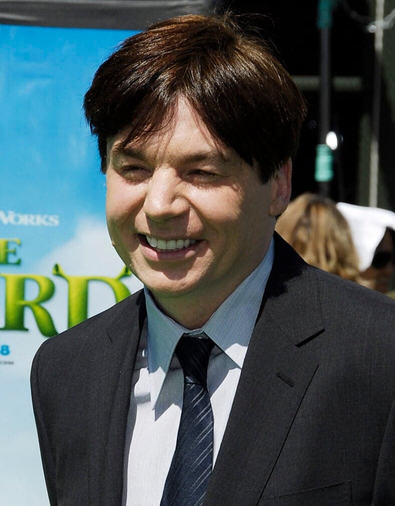 Mike Myers posing on the red carpet. 