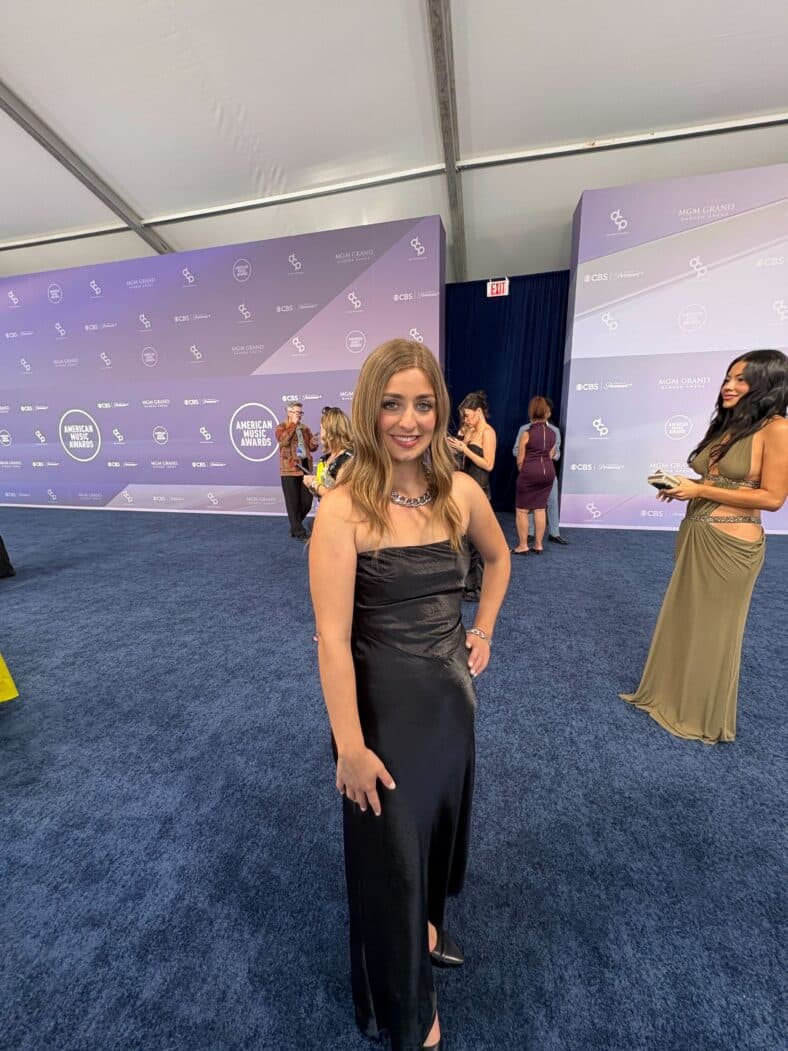 Abbey Romeo in a black dress at the 2026 American Music Awards