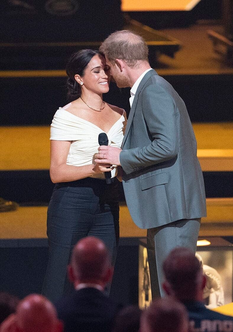 Meghan Markle and Prince Harry on stage
