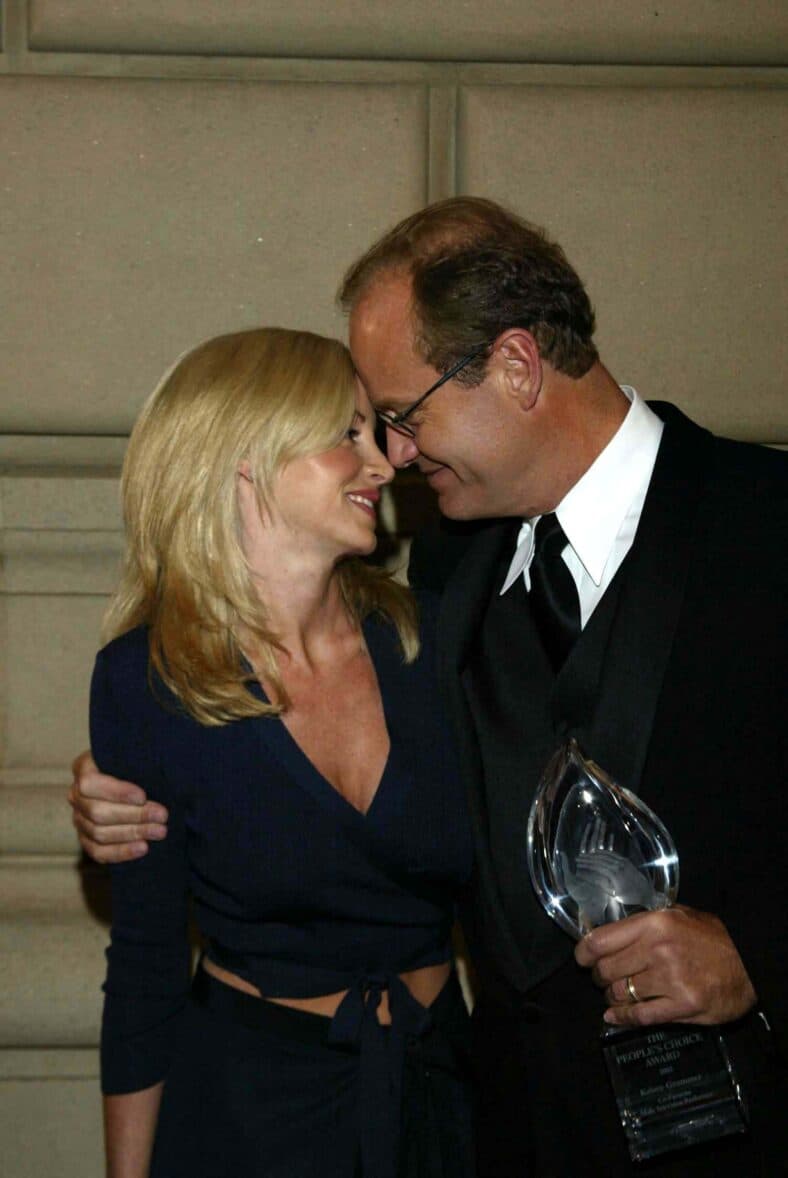 Camille and Kelsey Grammer posing on the red carpet. 