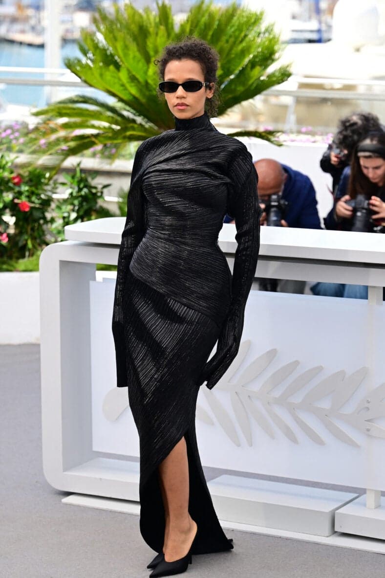 Taylor Russell in a black dress