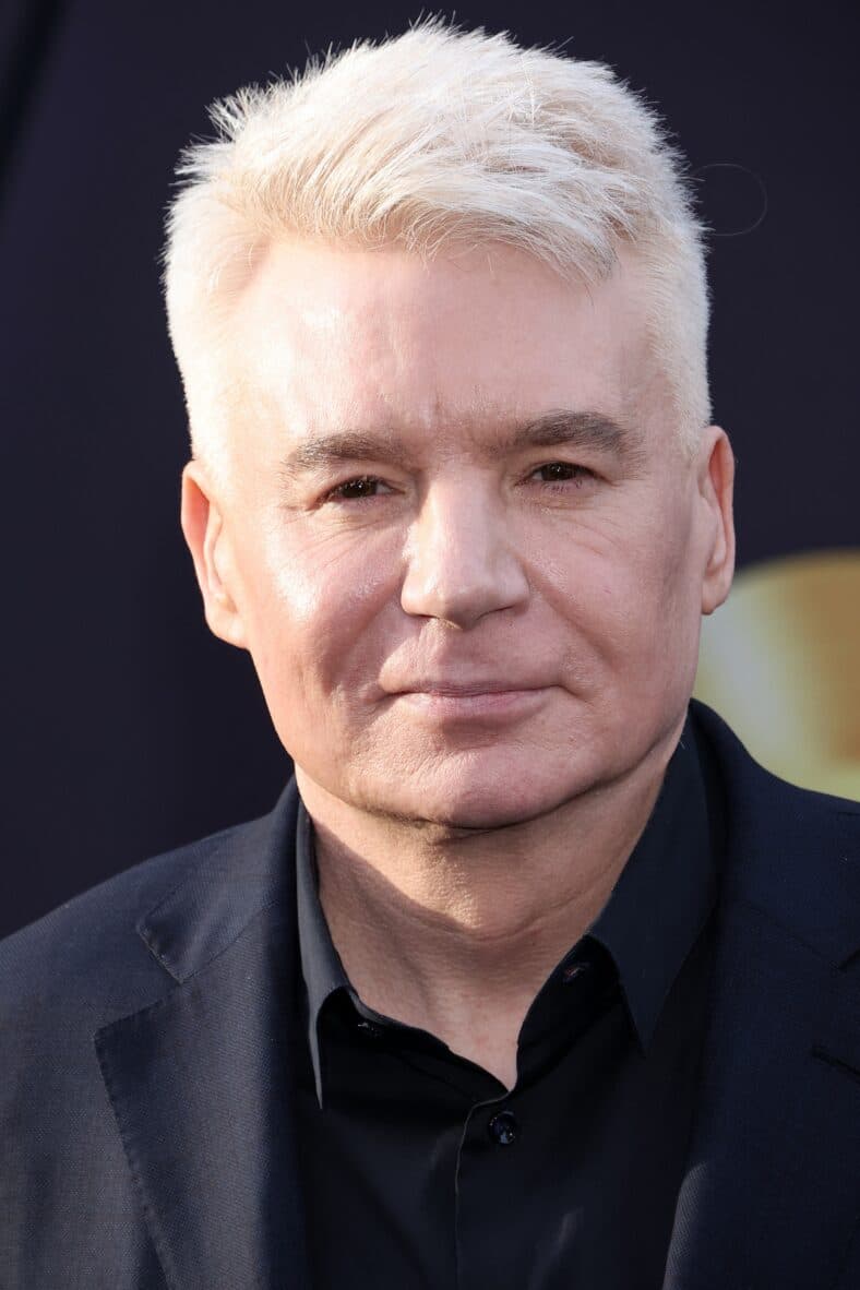 Mike Myers posing on the red carpet. 