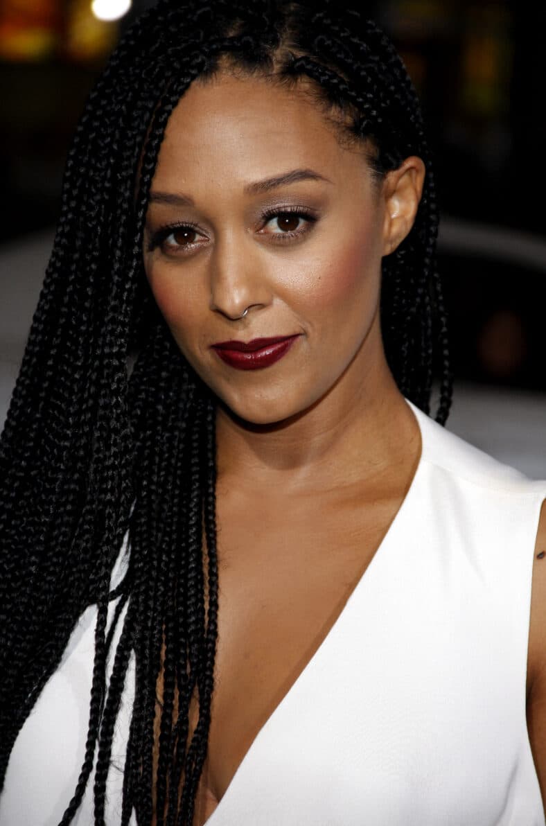 Tia Mowry posing on the red carpet.