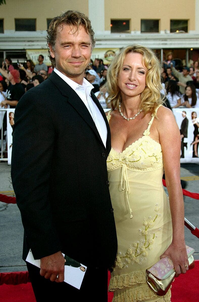 John Schneider and Elly Schneider at the World premiere of 'Mr. & Mrs. Smith'