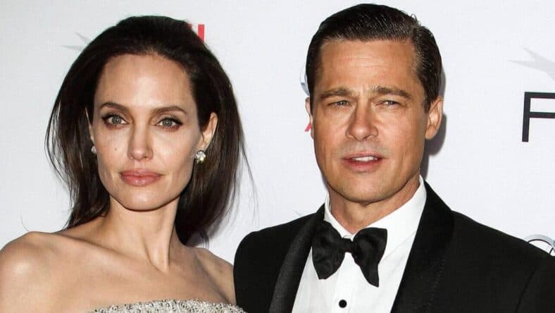 Angelina Jolie (wearing an Atelier Versace gown and Procop jewels) and Brad Pitt (wearing Lanvin) arrive at the opening night gala premiere of Universal Pictures' 'By the Sea' during AFI FEST 2015 presented by Audi held at the TCL Chinese Theatre IMAX on November 5, 2015 in Hollywood, Los Angeles, California, United States. 05 Nov 2015