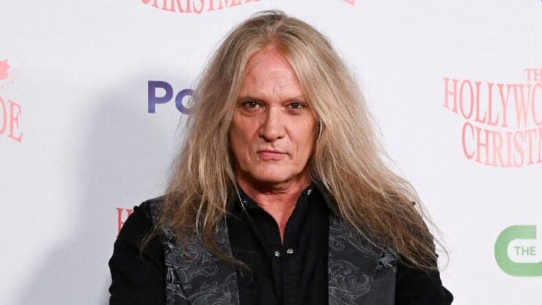 Sebastian Bach poses for photos
