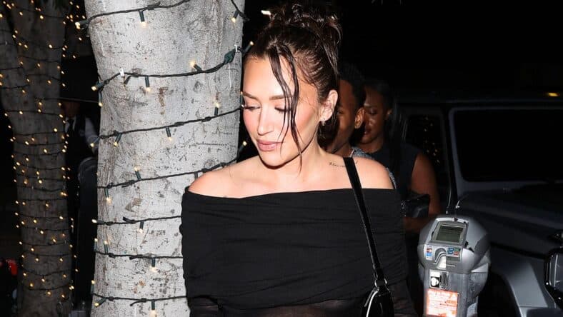 Stassie Karanikolaou in black
