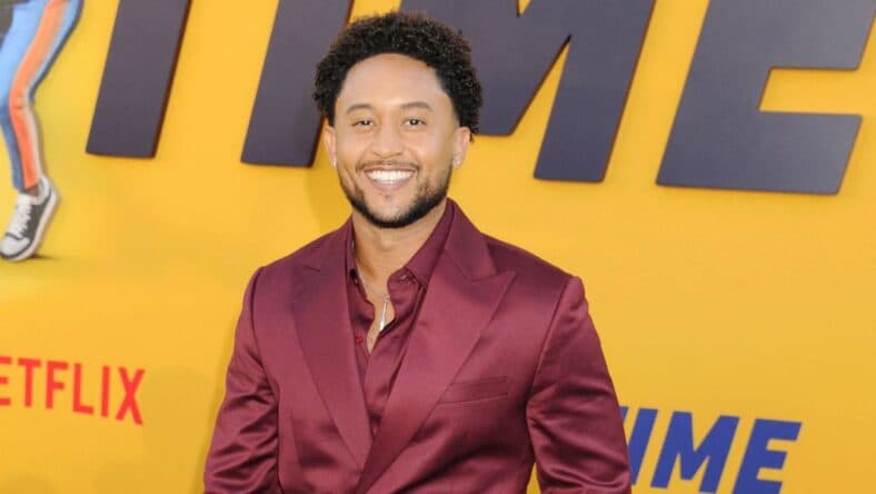 Tahj Mowry smiling