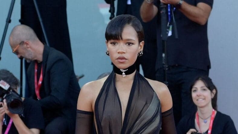 Taylor Russell posing on the red carpet