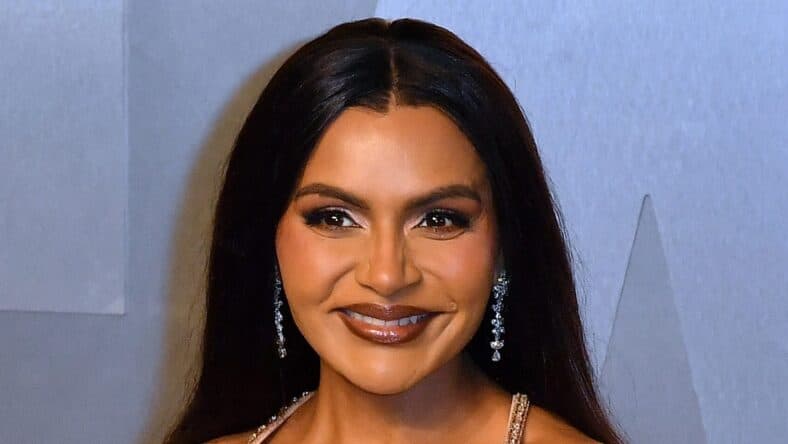 Mindy Kaling posing on the red carpet.