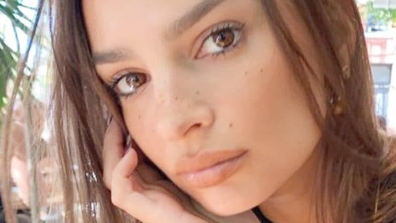 Emily Ratajkowski posing outdoors
