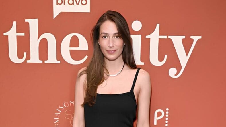 Amanda Batula posing on the red carpet.