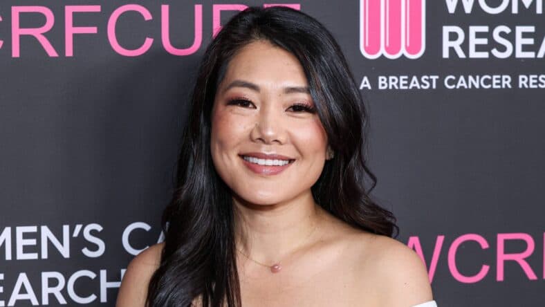 Crystal Kung Minkoff posing on the red carpet.