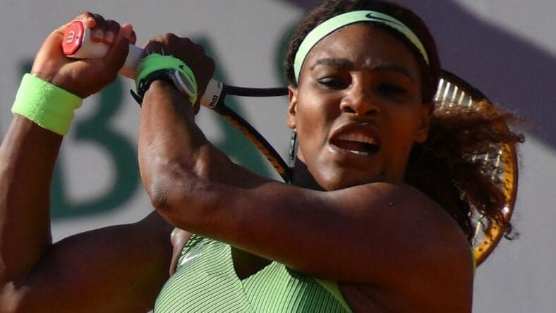 Serena Williams serves against Elena Rybakina