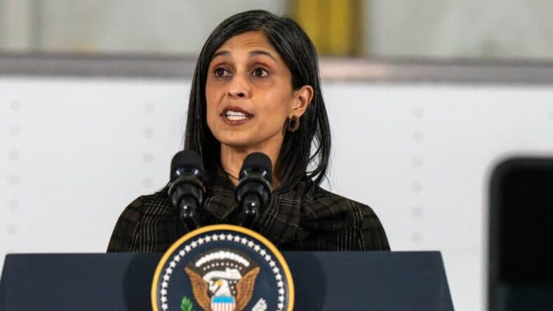 Usha Vance presents a speech at a podium