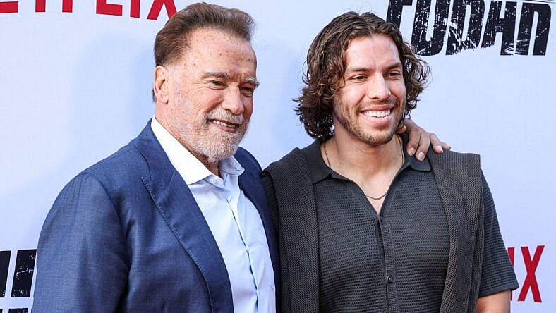 Arnold Schwarzenegger and Joseph Baena at the Los Angeles Premiere Of Netflix's 'FUBAR' Season 2