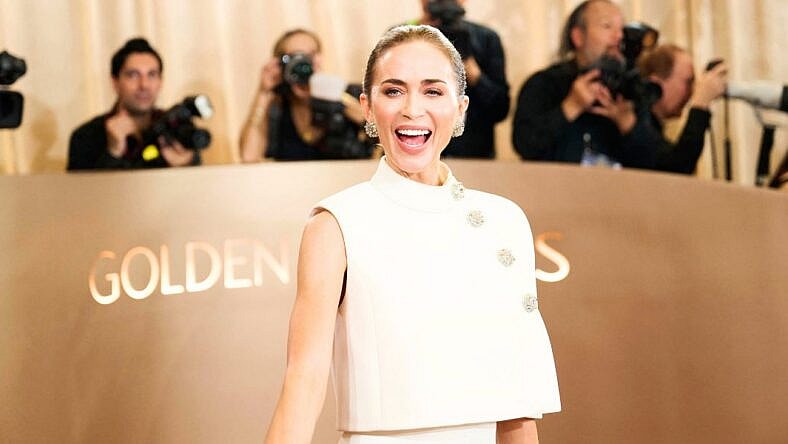 Emily Blunt laughing on the red carpet