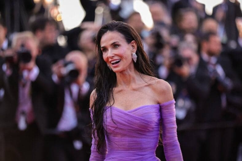 Demi Moore stuns in purple at Cannes