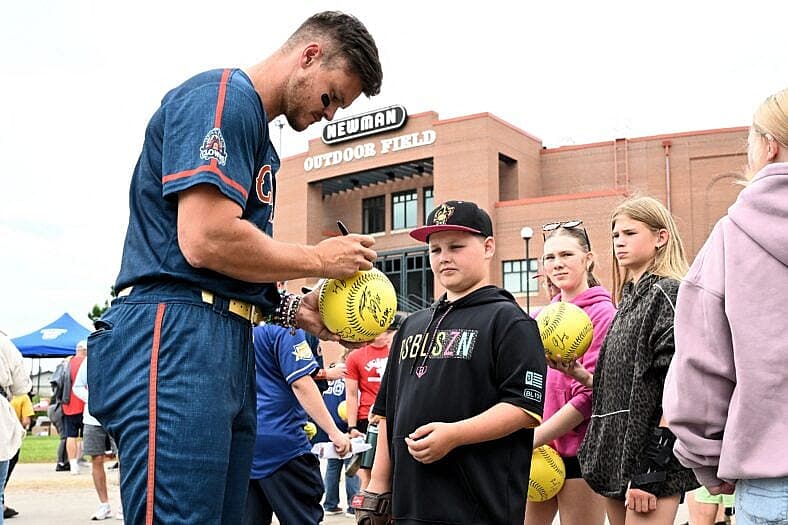 Banana Ball 2026: Firefighters Vs Clowns players signing autographs