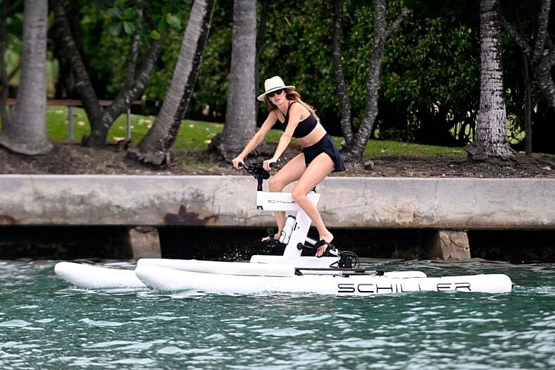 Gisele Bundchen ride water bikes in Miami