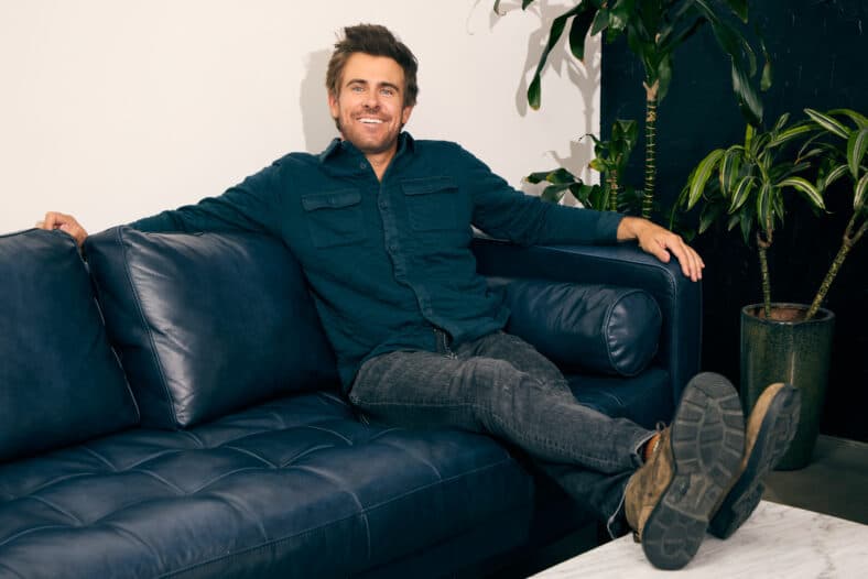 Garrett Patten sitting on a couch