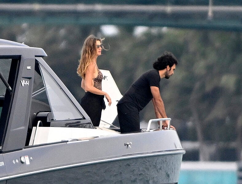 Gisele Bundchen and her boyfriend Joaquim Valente share lots of PDA on their new boat in Miami