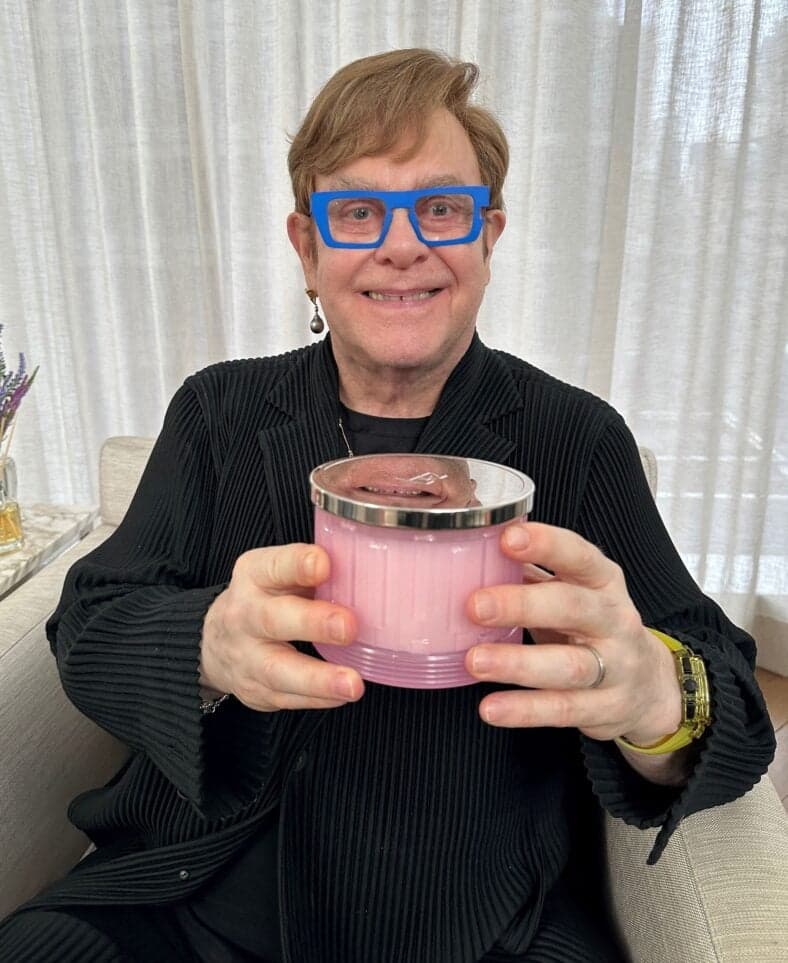 Sir Elton John shows off a scented candle