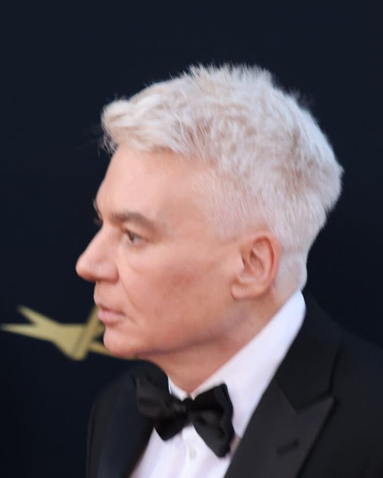 Mike Myers posing on the red carpet. 