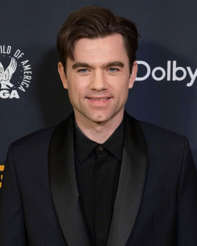 patrick ball, the pitt, posing on the red carpet. 