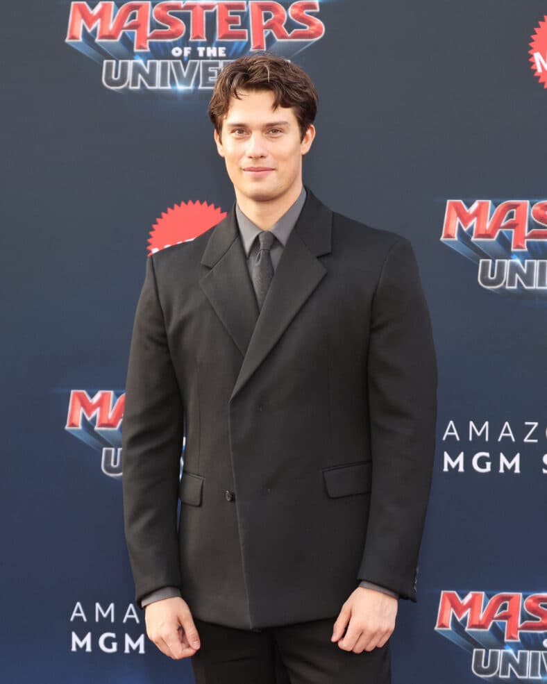 Nicholas Galitzine  in a black suit 
