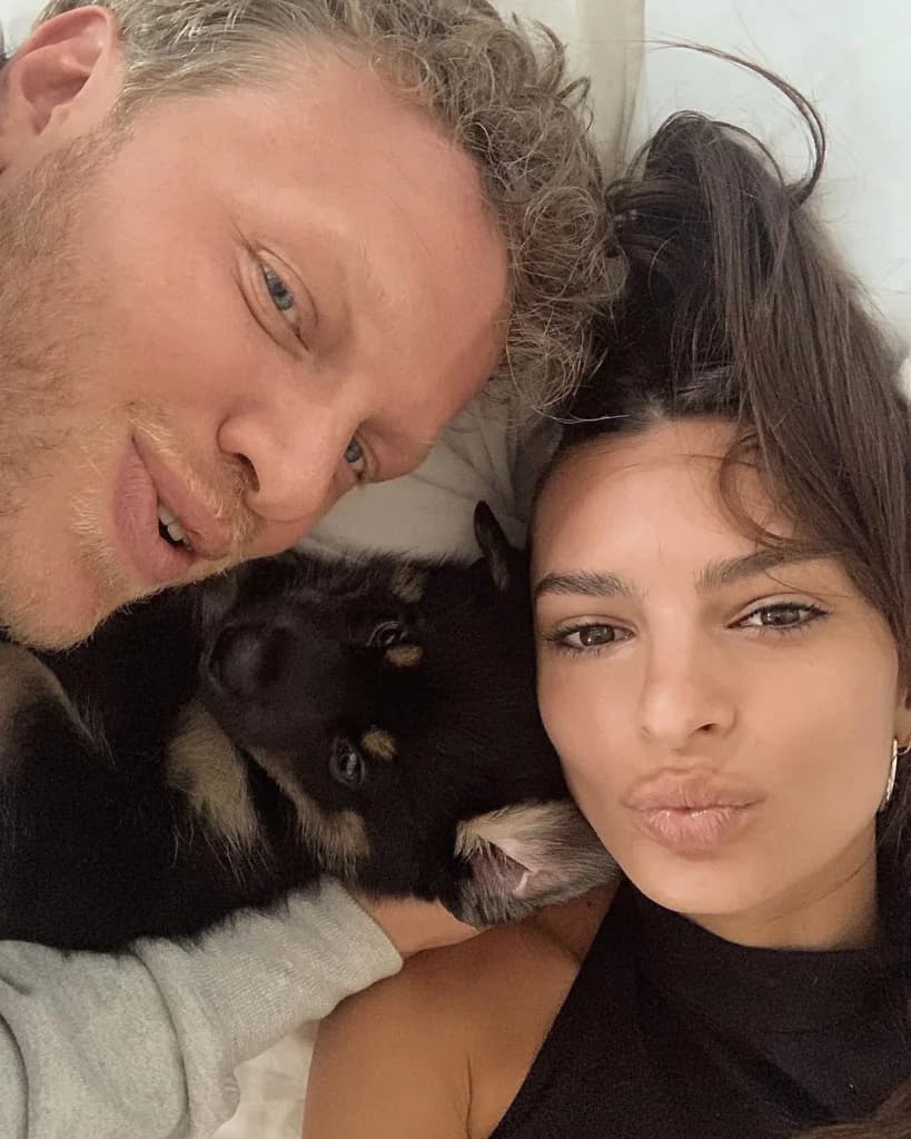Emily Ratajkowski with Sebastian Bear-McClard and a black dog