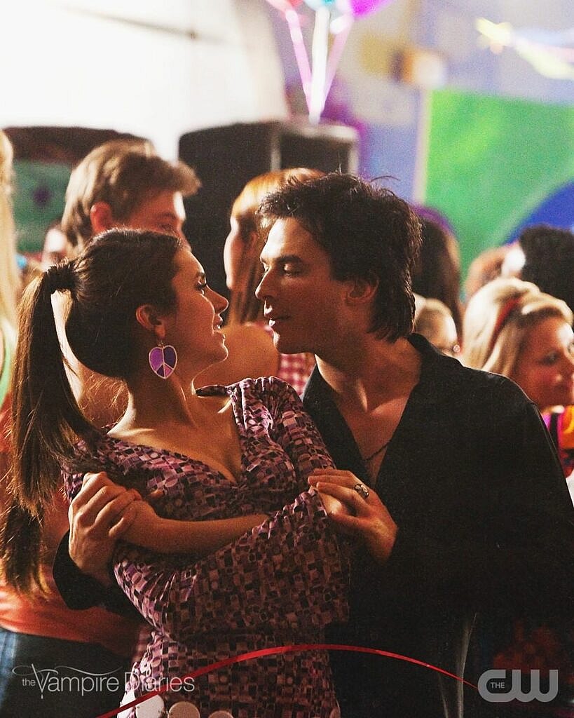 A photo showing Nina Dobrev and Ian Somerhalder dancing