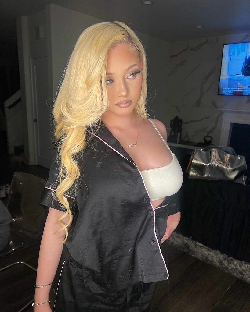 Alabama Barker posing for the camera.