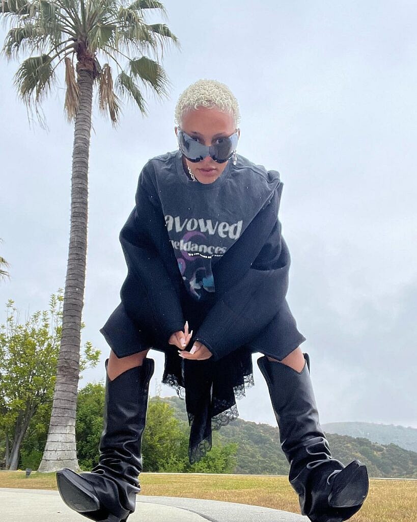 Doja Cat draws "Attention" standing naked