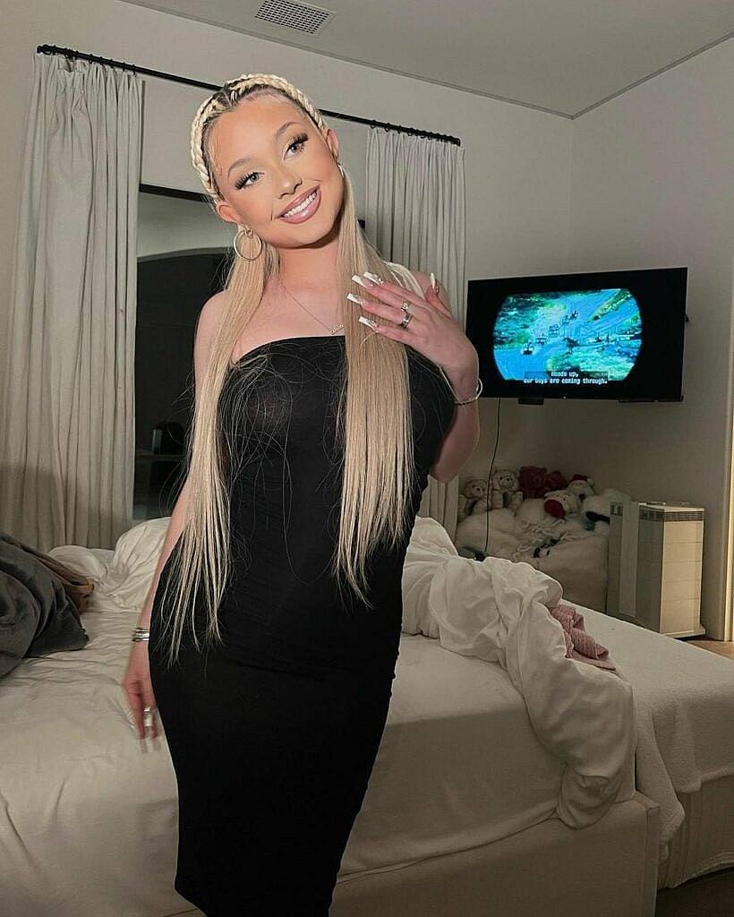 Alabama Barker posing for the camera.