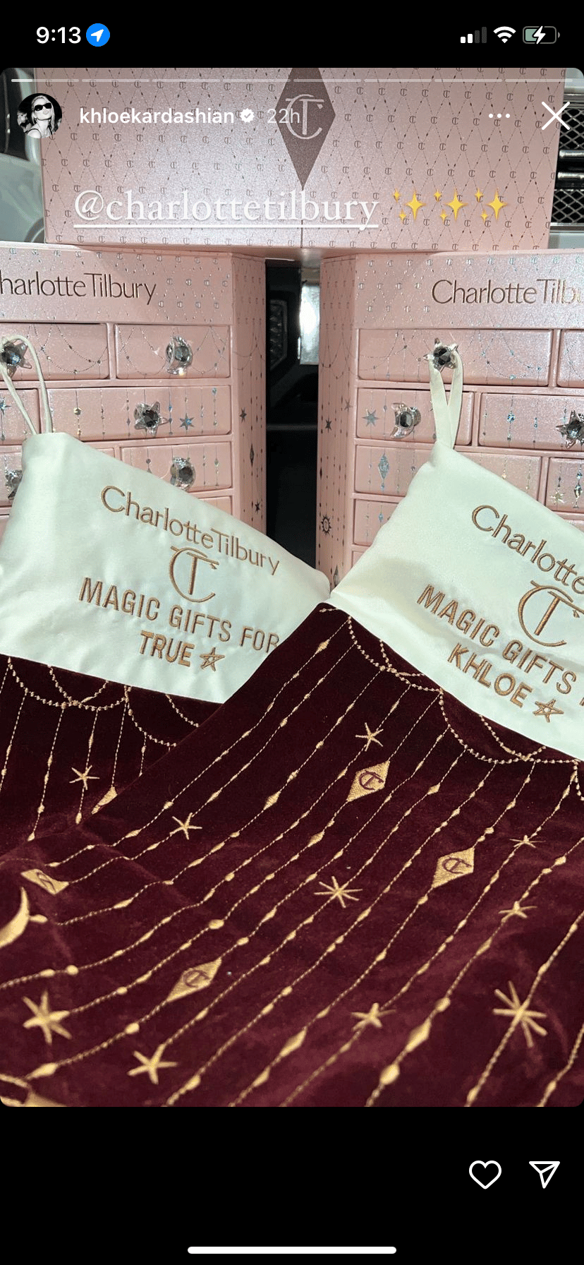 Charlotte Tilbury luxury gift boxes and cosmetic organizers displayed with personalized gift bags.
