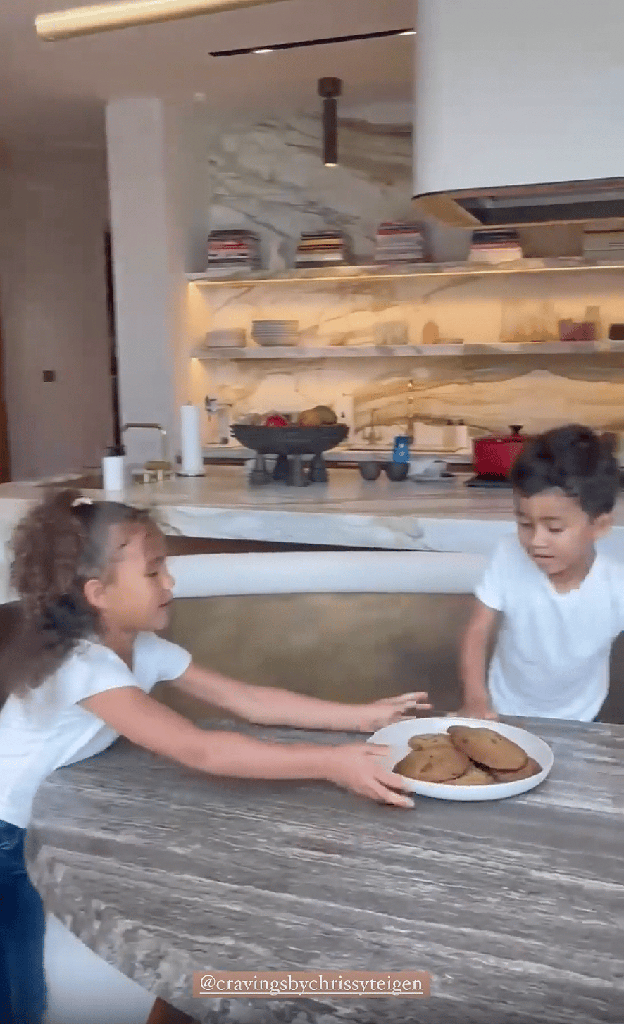 Chrissy Teigen's daughter Luna cooking