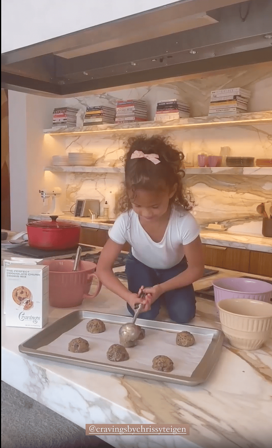 Chrissy Teigen's daughter Luna cooking