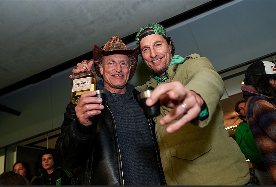 Matthew McConaughey enjoying some tequila with Woody Harrelson