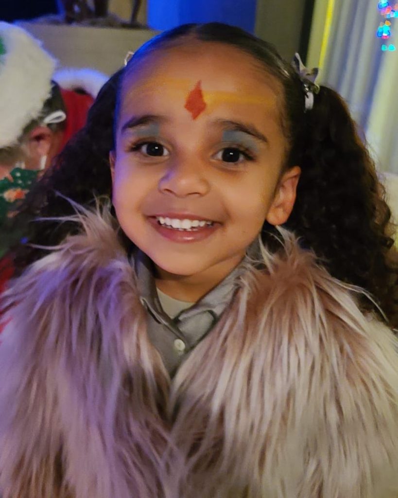 Dream wearing Wonder Woman makeup.