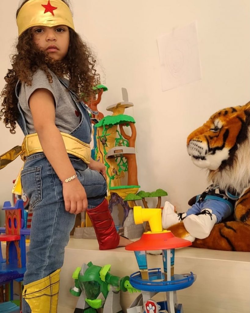 Dream Kardashian dressed as Wonder Woman