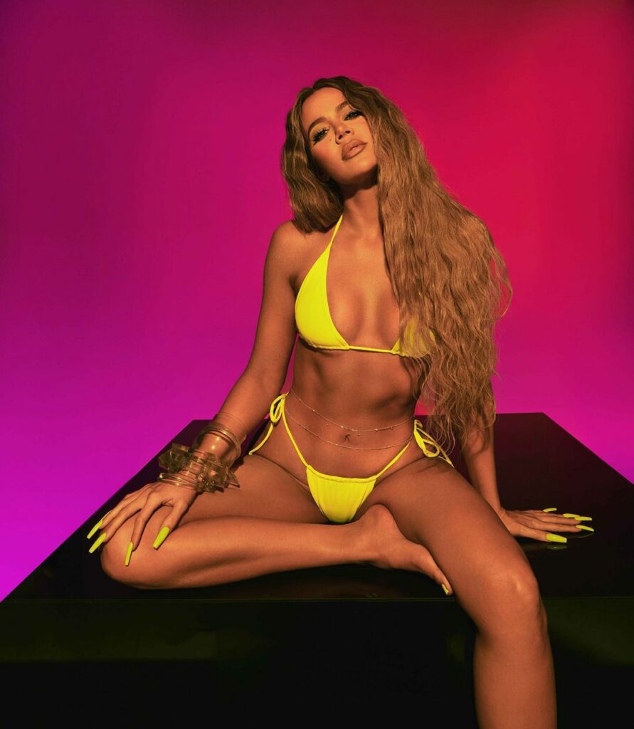 Khloe Kardashian rocks a neon green bikini